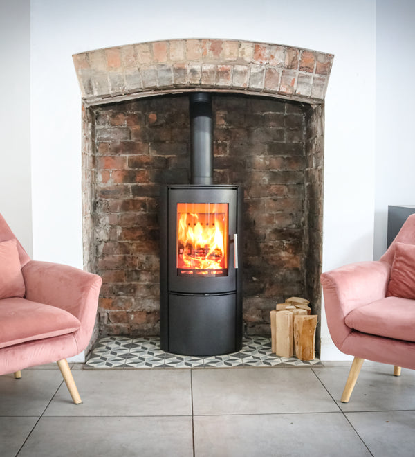 Woodford Charlton multi-fuel stove in a modern living room – high-efficiency log burner on Black Friday sale at Cool Heat Solution